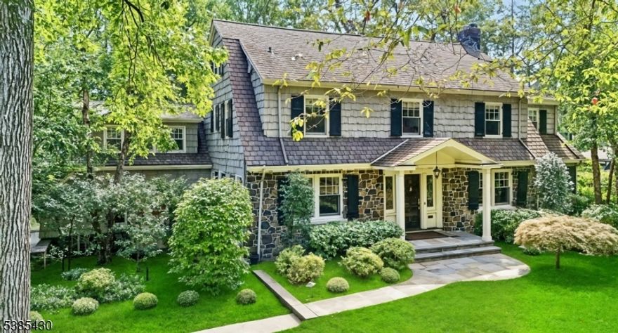 MAGNIFICENT CUSTOM-BUILT COLONIAL* PREEMINENT SHORT HILLS LOCATION * Nestled on over half an acre at the end of a tree-lined street, this home welcomes you with an impressive, open foyer w/ stunning staircase that streams sunlight frm multiple windows. Entertain in LR with a two-sided fireplace, host in the formal DR, work in the wood-paneled library w/ beautiful bookshelves or gather in the heart-of-the-home, the wonderful kitchen-family room. The state-of-the-art kitchen features custom cabinetry, SS applcs (SubZero/Viking/Miele), quartz island w/ bar seating & gracious breakfast room that opens to the fireside family room with coffered ceiling. A tricked-out mudroom, PR & 2-car garage complete this level. Upstairs, 6 BRs & 4FBs span the 2nd/3rd flrs, providing restful retreats for everyone.The luxurious primary suite includes a stunning bath with glass shower, clawfoot soaking tub & 2 generous walk-in closets. LL: laundry rm, gym space, rec room & possible wine cellar. Outdoors, find 2 patios, firepit, fully fenced property w/ open lawns & specimen plantings -- a serene retreat with room for play & entertaining (room for a pool!).. MORE: Sonos-ready speakers, security system, Ring doorbell, built-in generator, Pella windows & sprinkler system. Peaceful & private, yet minutes to top-rated Millburn schools (Deerfield Element), niche boutiques & trains to NYC. The perfect harmony of refined luxury & everyday comfort. YOUR DREAM HOME in an unbelievable Short Hills location!