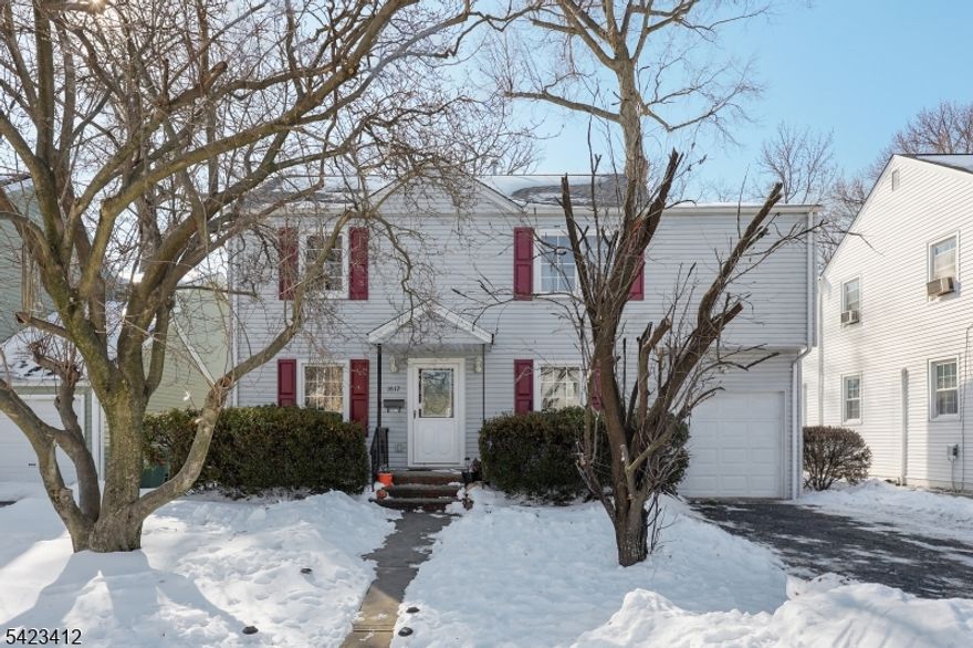 This unique home offers southern exposure and an oversized yard, bringing in beautiful natural light. Expanded and upgraded in 2012, it features an extended primary bedroom, a spa-like primary bath with soaking tub and separate shower, plus an enlarged kitchen and den designed for year-round sunshine. The kitchen and den open to a spacious Trex deck and fully fenced backyard, perfect for private outdoor entertaining. Dual gas HVAC systems with Nest controls provide comfort and energy efficiency, while a gas fireplace adds warmth to the den. A half bath is located on the main level, with two full baths upstairs. The full unfinished basement includes a washer and dryer, generous recreation space, and a 200 sq. ft. bonus room ideal for a gym, playroom, or hobby area. Upstairs, the primary suite is over 200 sq. ft. with a private bath, along with two additional bedrooms featuring closets and bright corner windows.  **Property is unfurnished**