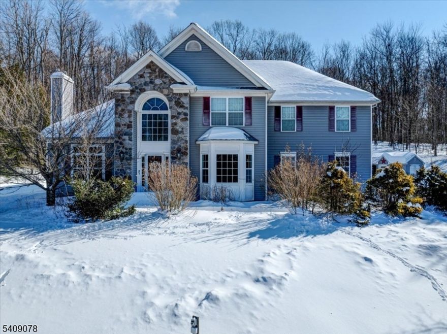 Welcome to this well maintained 4-bedroom, 2.5-bath colonial built in 2006, nestled on a quiet street in one of Vernon's most sought-after communities, Whispering Woods. This 1.67-acre private retreat offers a true sense of seclusion amid natural beauty. Step inside to find tall ceilings that enhance the open, airy ambiance, paired with a large kitchen perfect for entertaining. The full unfinished walkout basement provides endless potential ideal for a rec room, gym, home theater. Outside, the expansive grounds create a peaceful private retreat, complete with an exceptional outdoor entertainment area perfect for gatherings, relaxation, or simply enjoying the tranquility of your own wooded oasis. As the crown jewel of the backyard, dive into your own sparkling built-in saltwater pool. Enjoy a luxurious, low-maintenance swimming experience that invites relaxation and fun, seamlessly blending into the serene, natural surroundings.  Just minutes from Mountain Creek Resort for premier skiing, snowboarding, ziplining, and summer waterpark thrills. A quick drive to charming Warwick NY, offering hiking trails, scenic orchards, acclaimed wineries, farm-to-table dining, and more. Discover the perfect blend of peaceful country living, convenient recreation, and resort-style luxury right at home as well as the close proximity to Rt 23. This exceptional property is a rare gem schedule your private tour today!