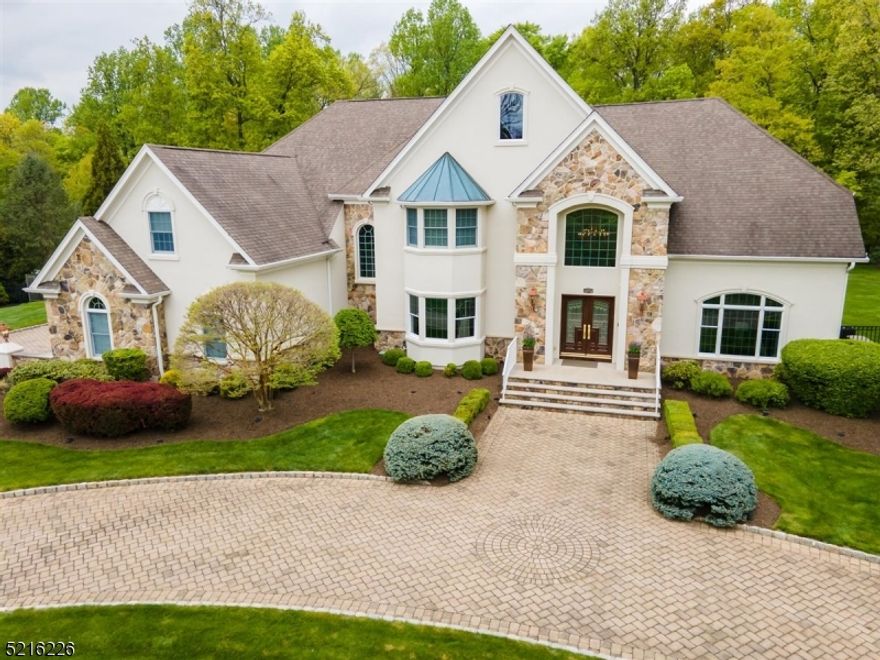 Rare opportunity to own this exceptional classic colonial home in one of Warrens's most desirable cul de sac locations. Enjoy estate-style living in this beautifully maintained and updated home.  The complete living style includes an open floor plan with a grand entry with sweeping staircases, a 1st-floor guest suite plus a 1st-floor office/library area, and an oversized dining room with a bay window.  The great room with soaring ceilings has views into the newly updated chic gourmet kitchen which is  2nd to none with a service bar with sink, and storage area. All new SS appliances, light fixtures, and fabulous countertops.   2nd floor includes 4 bedrooms 3 baths and a huge walk-in storage closet. Relax in your primary suite. The sitting room has its own fireplace! 2 large walk-in closets and a generous-sized primary bath with a separate tub and stall shower area.  The finished lower level has a great recreation room, a full bathroom, 2nd laundry room, a gym room, and a kitchenette. There is a walk-out stair area that accesses the magnificent private fenced-in backyard with a heated pool and pool house with electricity. The property on this home is one of the most usable, disaralbe property in the Emerald Pond neighborhood.