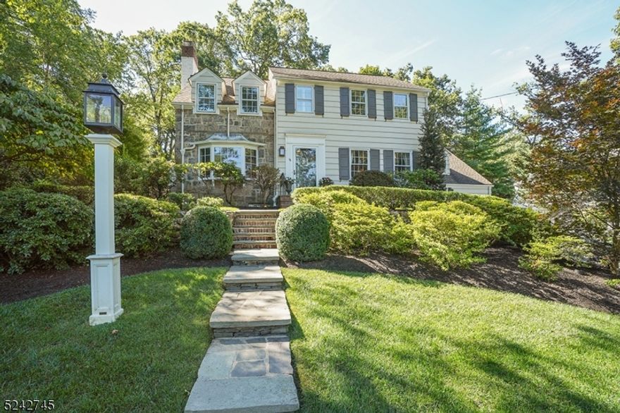 Location, location, location..this picture perfect center hall colonial has been meticulously maintained and beautifully appointed. Significant architectural detail and millwork enhance the elegant entry and formal rooms. Offering five bedrooms, 3 full baths and a powder room as well as a light filled, crisp eat-in kitchen with center island and an abundance of cabinetry. Both the kitchen and family room enjoy views of a stunning, beautifully landscaped backyard with brick patio. The 5th bedroom is ideal for guests, live-in help or a work from home space.  Conveniently situated within close proximity to Summit's vibrant downtown center, mid town direct transit and Summit's highly rated public schools.