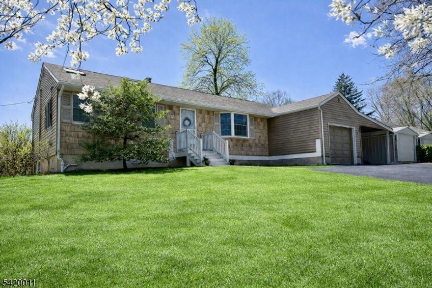 Opportunity knocks in one of Madison's desirable neighborhoods! This 3-bedroom ranch offers incredible potential to renovate, update, or create your dream home. The main level features three bedrooms, a full bath, a living room, a dining room, and an eat-in kitchen, while a second full bath is located in the basement. The lower level provides additional living space with a recreation room complete with a wet bar perfect for entertaining or relaxing along with a dedicated laundry room for added convenience. A 1-car attached garage plus a carport offer ample parking and everyday ease. With a functional layout, spacious living areas, and a generous lot, this home is ideal for buyers looking to add value. Enjoy all that Madison has to offer known for its vibrant downtown filled with a variety of restaurants, shops, and conveniences, plus easy access to the NYC train for a seamless commute. A rare chance to get into a sought-after community and make it your own.