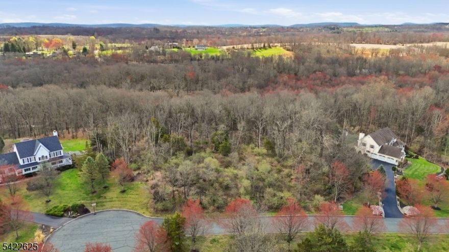 Positioned at the end of a quiet cul-de-sac in Meadow Ridge, this exceptional 3.09-acre parcel in desirable Knowlton Township offers the perfect blend of privacy, natural beauty, and upscale surroundings. Surrounded by well-appointed homes, this property provides a rare opportunity to potentially build your dream residence in an established and scenic neighborhood. Enjoy breathtaking mountain views and a serene setting that feels miles away from it all yet remains conveniently located for commuting and everyday needs. Buyer is responsible for conducting all due diligence regarding building approvals, zoning requirements, utilities, and any other necessary verifications. Don't miss this chance to create your own private retreat in one of Knowlton Township's most picturesque locations.