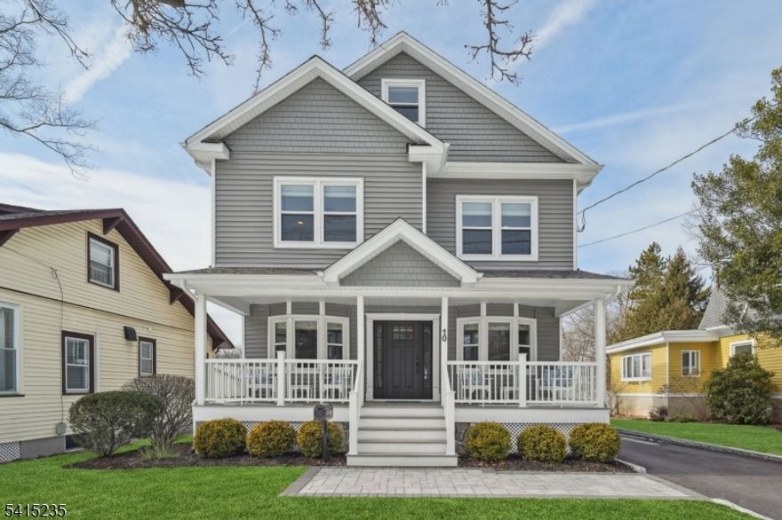 Welcome to this turn-key Center Hall Colonial just steps to Laning Elementary School. Built in 2001, this beautifully maintained 3 bedroom, 2.5 bath home with a versatile 3rd floor bonus space that offers endless possibilities as a home office, game room, or guest bedroom. The bright updated kitchen features stainless steel appliances, rich wood cabinetry, and a center island, flowing effortlessly into the living space for comfortable everyday living and entertaining. Hardwood floors run throughout the main living areas, adding warmth and character. Upstairs, the primary suite features a renovated en-suite bathroom, a second-floor laundry room provides everyday convenience. The finished basement with high ceilings and built-in wet bar creates an exceptional recreation and entertaining space, perfect for hosting gatherings, relaxing movie nights, or game-day celebrations. Step outside to your backyard oasis featuring a beautiful stone patio and fenced yard with a large flat grass space with endless possibilities! The oversized 2 car garage features a walk up loft area for additional storage space. Additional upgrades since 2011 include a new roof, windows, exterior doors, front and back porches, HVAC systems, boiler, hot water heater, driveway, renovated baths, backyard fence! Perfect Verona location close to schools, parks, and downtown amenities. Simply unpack and enjoy everything this beautifully updated Verona home has to offer!