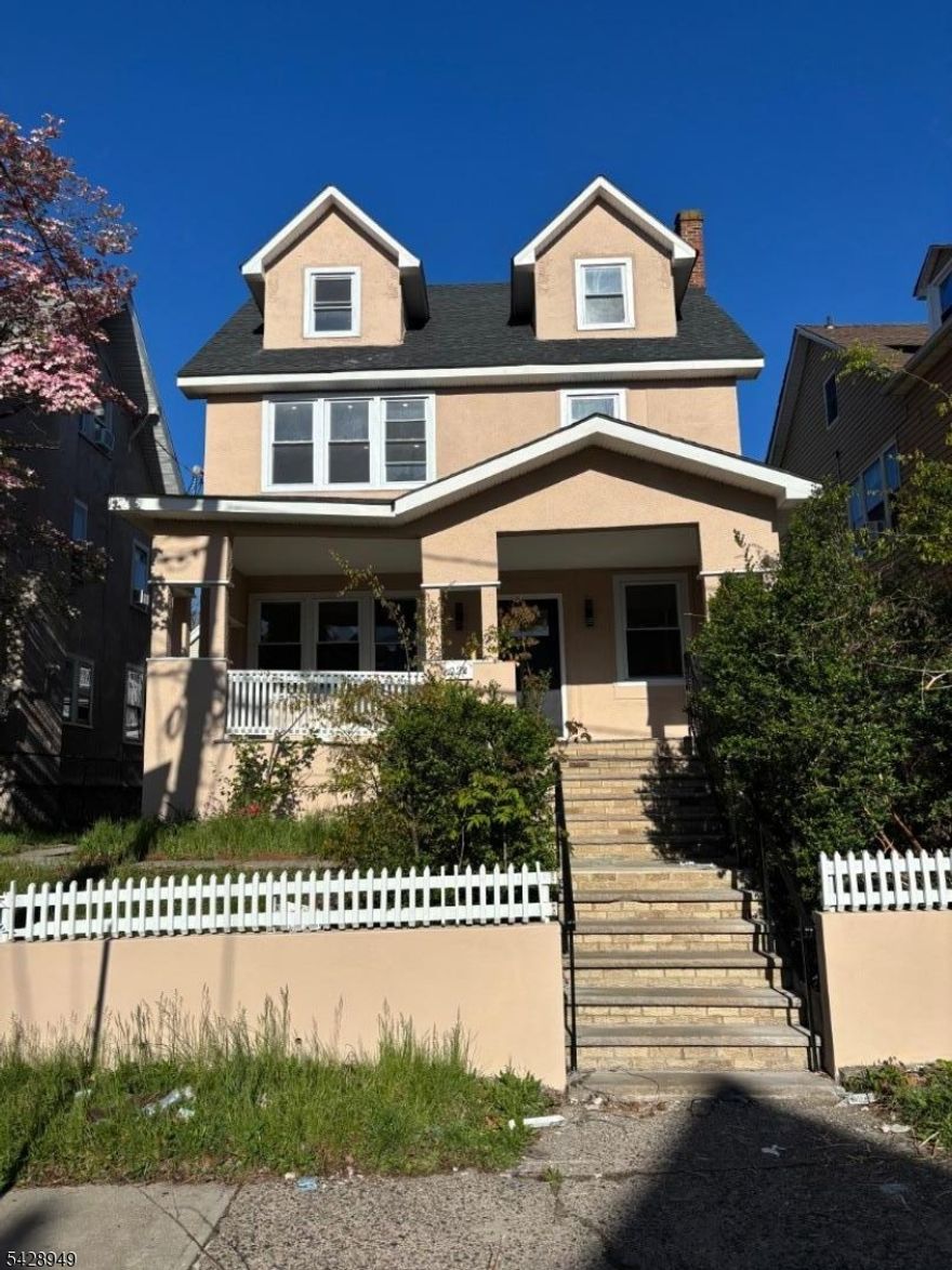 Welcome to this beautiful, completely renovated home! An open concept first level features the living room, formal dining room, kitchen and a bath. The second level features 3 good sized bedrooms and a full bathroom. Two additional bedrooms and 1 full bathroom complete the third level. Basement is unfinished. Conveniently located near parks, local shopping and easy access to transportation. Don't miss the opportunity to make this home yours!