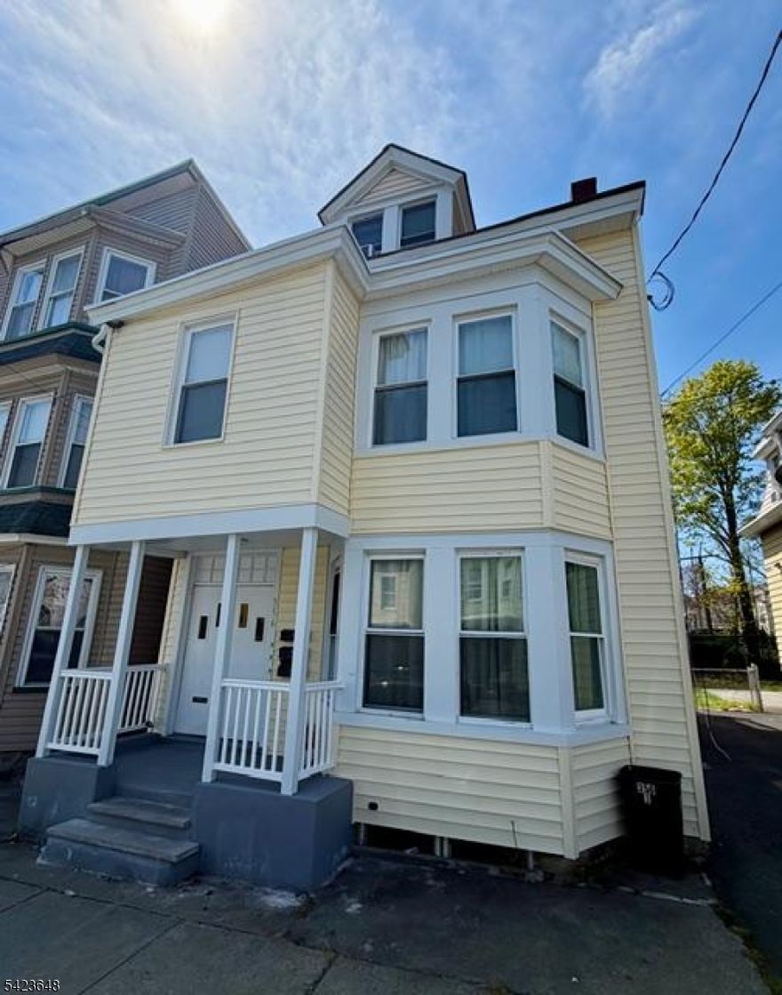Spacious, fully furnished 1-bedroom apartment in a multi-family home. Features newer flooring throughout and a functional layout. Prime location within walking distance to Main Street shops, restaurants, and NYC transportation. No smoking and no pets.