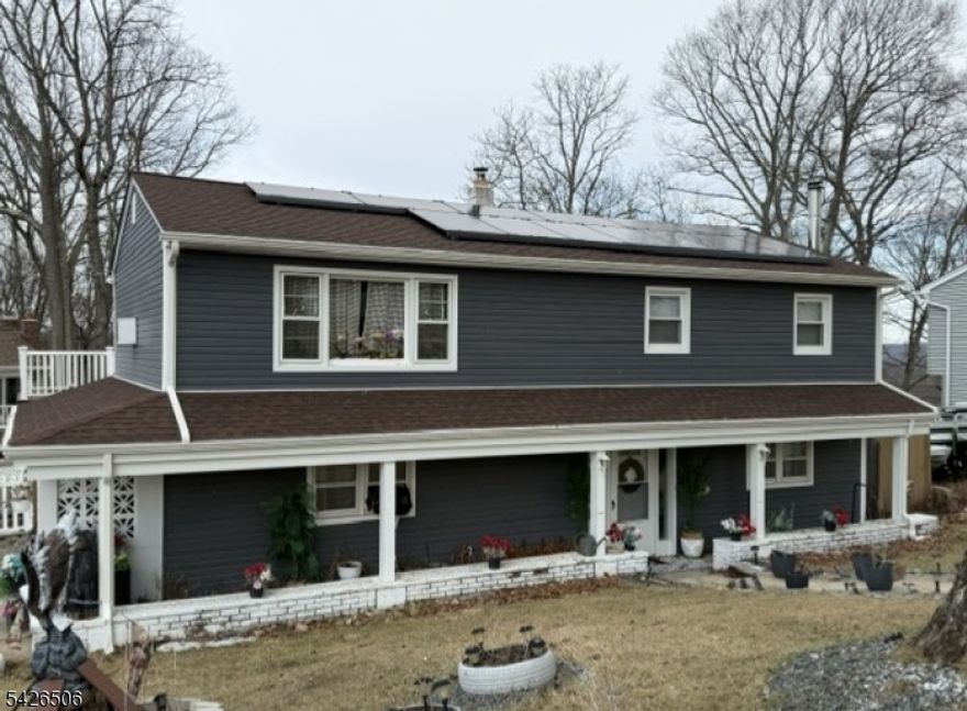Updated 3 Bedroom, 2 Bathroom home on a quiet street in one of Hopatcong's most peaceful neighborhoods. This move-in-ready home shows real pride of ownership, with a renovated kitchen, updated bathrooms, newer siding and roof, plus a two-story deck, above-ground pool, and hot tub. Natural light fills the warm, comfortable living spaces, and the layout flows easily for today's lifestyle. The yard offers a great spot to relax or gather, and you're just minutes from local parks, Lake Hopatcong, schools, and commuter routes. Home offers 2 driveways with parking for 4 cars + 1 in the attached Garage.  A solid, well-updated home in an established community with beautiful sunset views.
