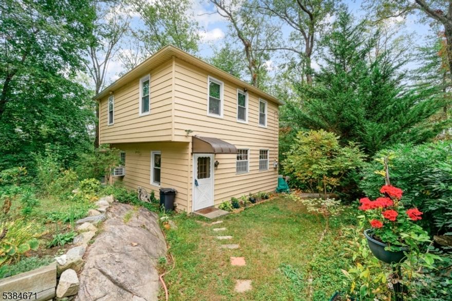 BACK ON THE MARKET! Very private on top of the hill property waiting for the new owner! 4 bedroom, 2.5 bath home sits on a quiet neighborhood. First floor lead you to the kitchen, dining room, living room, full bath, and laundry room. Make your way upstairs to find the master bedroom and full bath. 4 additional bedrooms, and a full bath on the second floor. The side door off the laundry room to access the private patio and spacious backyard. exclusive parking spots in the driveway and an oversized shed. Minutes from restaurants, schools, and all major highways.  This s a Scenic, Quiet, Mountain Road, within minutes walking distance from a plaza offering Restaurants, Pharmacies, Manhattan Bus Stop, Liquor Stores, Barber Shops, etc.