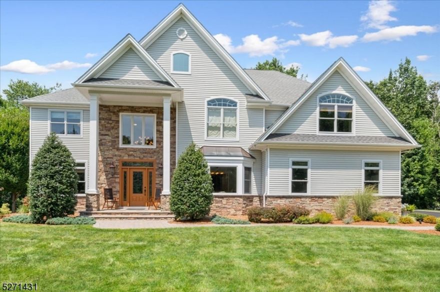 Meticulously built home by builder/owner with many upgrades. Quiet Cul-de-sac lot, flat beautifully landscaped yard with IPE deck, sun awning and wooded backyard for privacy. Two story foyer with wide staircase to open hallway. Loft with custom crown molding/trim throughout home. Pella aluminum clad windows, central vacuum and stunning 2 story Crawford ceiling family room with wood burning fireplace.  Large kitchen with eat- in area, 2 tier island, Omega cherry cabinetry and built in Jenn-Air appliances. Spacious formal dining room with tray ceiling, office laundry room and 1/2 bath with instant hot water completes the first floor. Home has 4 large bedrooms and total of 4.1/2 baths. Master suite has a tray ceiling, 2 walk-in closets and large bath. From the bedrooms is a second wide staircase back to the kitchen. Full walk out basement partially finished with high ceilings, full sized windows, full bathroom and bar-sink with counters. Finished heated 3 car garage with custom shelving and epoxy floor. Generator with manual switch included. Shed with electricity. TGI construction with no settling cracks. Newer driveway with stone apron. Property is super convenient to shopping, businesses, highway, parks, etc. A MUST SEE!