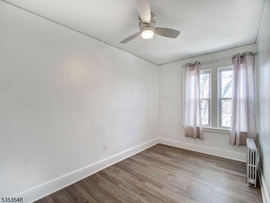 Stylishly renovated 2-Family Duplex on a charming tree-lined street!  Welcome to 16 McKay Avenue-- a beautifully updated, modern 2-family duplex offering a perfect blend of style and functionality. Only the right side of the building is available for sale! Each unit features 2 spacious bedrooms and 1 full bath, with approximately 1,100 sq. ft. of bright, open-concept living space. Step into sleek, designer eat-in kitchens complete with quartz countertops, white shaker cabinetry, stainless steel appliances, and classic subway tile backsplashes perfect for both cooking and entertaining. Recent updates include a brand-new roof and hot water heater (2024), ensuring peace of mind for years to come. The basement has two sets of washers & dryers, new sump pump and French drains. Enjoy private use of a detached garage via a shared driveway, and take advantage of the unbeatable location just minutes from major transportation hubs, and a short distance to Orange Park and Elmwood Park for all your outdoor activities. Ideal for investors or owner-occupants! The first-floor unit is tenant-occupied until 1/31/2026, while the upstairs unit is currently vacant and move-in ready.  This one won't last!