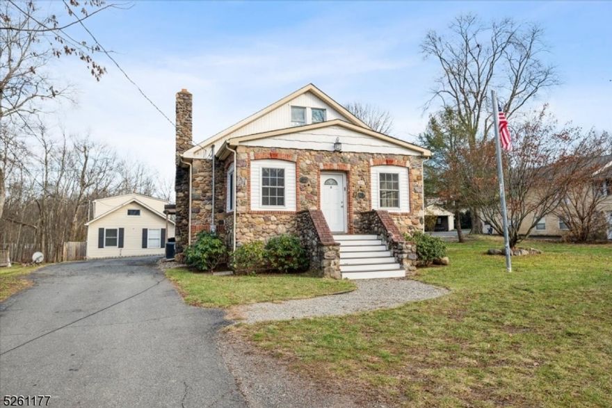 SO MUCH BIGGER THAN IT LOOKS!! First floor boasts all refinished hardwood floors. Large entry room with closet is perfect for all your coats and shoes. Huge living room - dining room offers tons of light and seamlessly flows into the beautiful eat in kitchen. There are 2 bedrooms on this level with a new full bath. Second floor has an additional 2 bedrooms, new full bath and tons of storage. The lower level walk out basement is massive and has an additional half bath, laundry and more storage space. Home also offers a large garage, and a shared backyard. There are 2 single family homes on this lot. Perfect commuter location as it is close to most major highways.