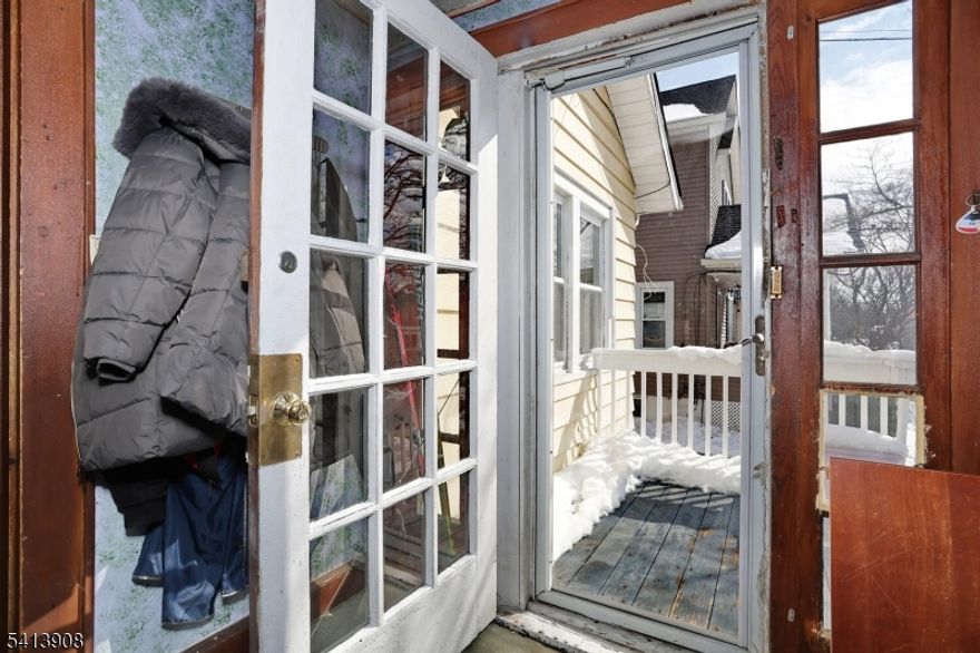 WELCOME TO THIS CHARMING HOME! 3 SEASON PORCH GREETS YOU AT THE FRONT ENTRY INTO THE WARM OPEN LIVING ROOM W/HARDWOOD FLOORING AND ORIGINAL CHESTNUT TRIM! THE FIRST FLOOR HOSTS TONS OF NATURAL LIGHT IN EVERY ROOM; A FULL BATH, SECOND BEDROOM, AND A LARGE EAT-IN KITCHEN WITH  SEP DINING AREA. THE SECOND LEVEL IS THE PRIMARY BEDROOM WITH LOTS OF STORAGE! THE BASEMENT IS PARTIALLY FINISHED WITH TWO SEPARATE AREAS FOR ALL OF YOUR NEEDS, A HALF BATH, LAUNDRY AREA, AND YOUR UTILITY ROOM. THE LOVELY YARD HAS AN OVERSIZED TWO-CAR GARAGE TO HOLD ALL OF YOUR ITEMS..EVEN YOUR CARS IF YOU ARE LUCKY!  THIS HOME IS IDEAL FOR YOU, WHETHER YOU ARE JUST STARTING AS A HOMEOWNER OR YOU ARE LOOKING TO HAVE A LITTLE LESS SPACE TO LOOK AFTER..IT WILL CHARM YOU!  GREAT NEIGHBORHOOD AND TOWN!  DO NOT WAIT!