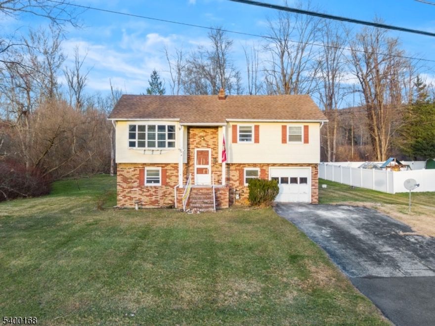 CONTRACTORS, INVESTORS- NATURAL GAS, PUBLIC WATER, NEWER ROOF! This one-owner home is an excellent opportunity for anyone looking to bring their own vision and updates to a great space. The main level offers beautiful hardwood floors throughout the Living Room, Dining Room and all 3 bedrooms. 2 over-sized Bay windows in the Living Room & Dining Room flood the space with natural sunlight. The lowered level offers an additional room plus a 2nd Living Room with sliders to the backyard.  Additionally there is a half bath, Utility Room, additional storage and access to the garage. The backyard is a blank canvas; open, level & butts up to a creek! The possibilities are endless! . With many of the original features still in place, this home is an ideal opportunity for renovation and personalization. Conveniently located in a well established neighborhood, minutes from Rt 23 & 15 H&B DUE BY 5PM SUN DEC 14