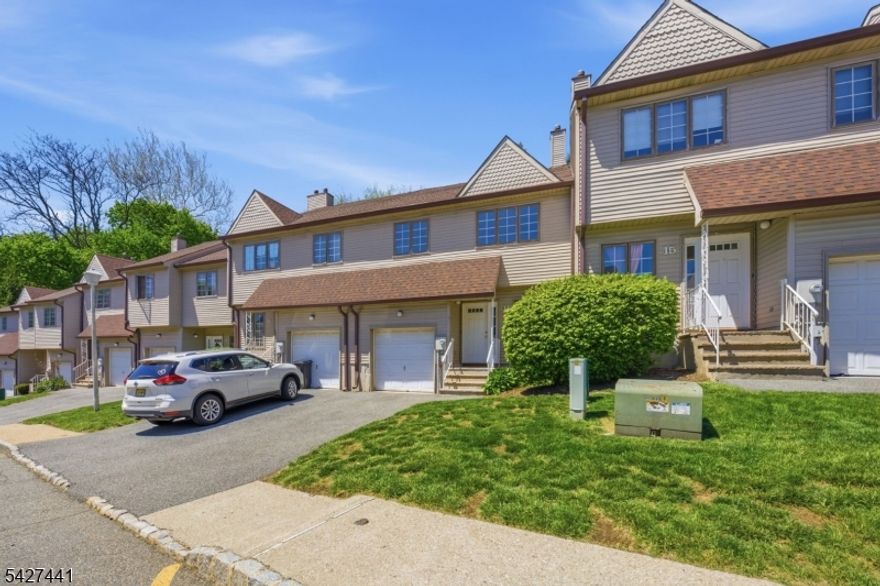 Updated townhouse with clean, well maintained finishes and a practical two level layout. The brand new kitchen features white cabinetry, solid surface counters, tiled flooring, gas range, microwave, dishwasher, and ample storage. Open living and dining area offers new carpeting, neutral paint, and a large sliding glass door leading to a private patio with a landscaped backdrop. Second level includes three spacious bedrooms with generous closet space, two full baths, and an in unit laundry room for convenience. Additional highlights include a one car garage with interior access, driveway parking, central air, forced hot air heat, and thermal windows. Located within a residential community setting with easy access to major roads and everyday amenities.