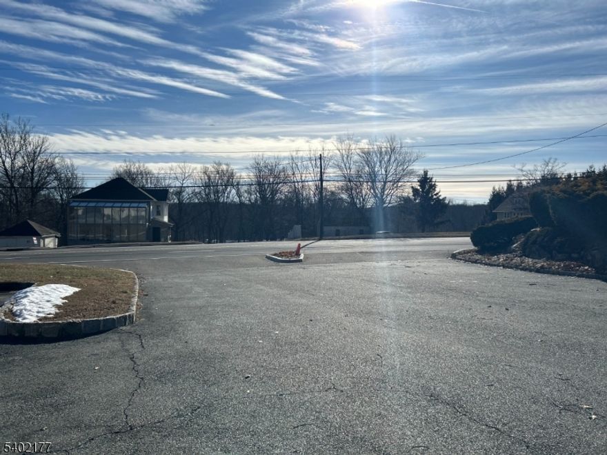 Establish or expand your business in Mount Olive with this outstanding commercial leasing opportunity. Conveniently located just minutes from Budd Lake and downtown Hackettstown, the property offers excellent visibility along the highly traveled Route 46. This versatile office condominium is ideal for a primary business location or a satellite office. The space features 1,456 square feet, two separate entrances, two half bathrooms, and garden windows that provide abundant natural light throughout. Ample on-site parking is available for both staff and clients. The lease includes exterior maintenance such as snow removal, lawn care, and upkeep of common areas, allowing you to focus on your business operations without added maintenance concerns. Offered as a blank canvas, this space is ready to be customized to suit your business needs. Schedule a tour today and explore the potential of this well-located commercial space.