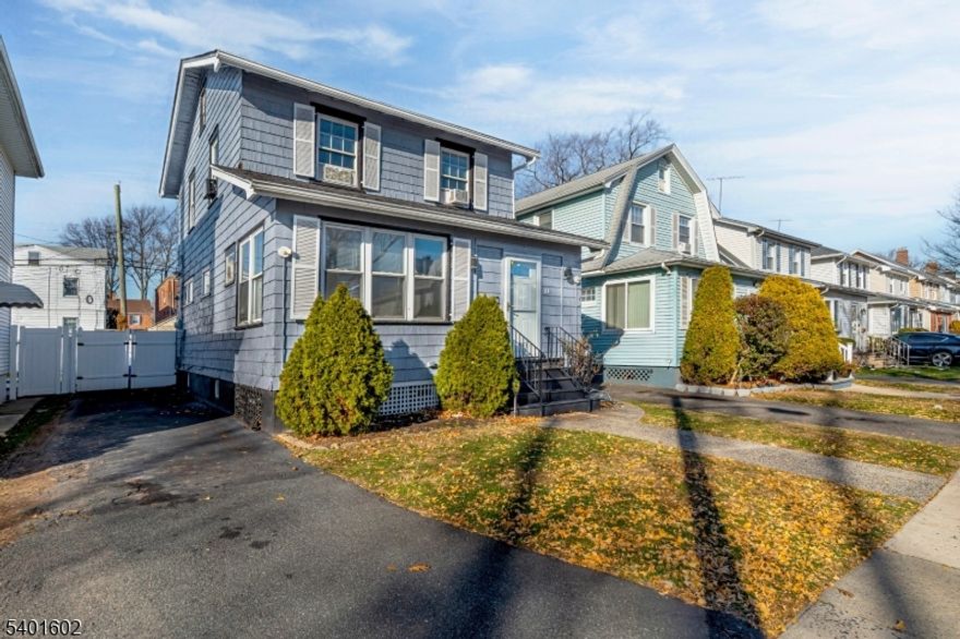 This single-family home in East Orange offers a comfortable layout filled with natural light and plenty of opportunity to make it your own. Set on a peaceful residential street, the home features three bedrooms and two full bathrooms, creating flexible living space that can easily adapt to a variety of needs. Large windows throughout allow sunlight to flow into the living areas, creating a bright and welcoming atmosphere. Glass doors open directly to a spacious deck, providing an ideal setting for outdoor dining, relaxing, or enjoying fresh air throughout the seasons. The layout offers a practical flow with rooms that feel open yet defined, making everyday living easy and functional. With solid bones and room for thoughtful updates, this property presents strong potential for someone looking to create a cozy personal space or explore long-term value. Conveniently located near local amenities, transportation options, and everyday essentials, this home offers both comfort and opportunity. A great option for buyers who appreciate natural light, outdoor space, and the chance to personalize a home to fit their vision.