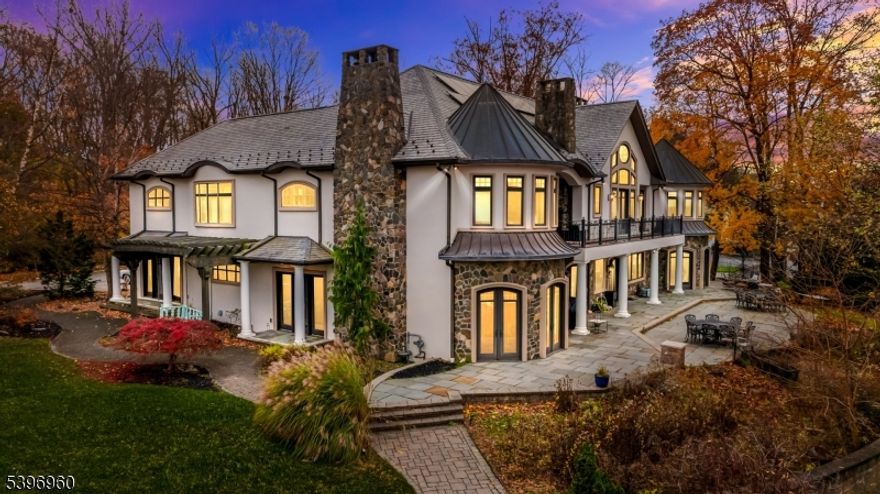 Experience resort-style living on Lake Hopatcong with approximately 15,000 sq ft of masterfully crafted interiors and 200 ft of pristine lake frontage. Enjoy a heated in-ground pool, waterfall, hot tub, and slate patio. Inside: grand staircase, rich wood details, custom cabinetry, and a gourmet kitchen! Multiple entertainment rooms and a luxurious primary suite offers a fireplace, soaking tub, and a walk-in dressing room. Additional highlights include an in-law/au pair suite, two laundry rooms, dog wash/mudroom, and 3-car garage. Public water and sewer. A rare opportunity to own a true lakefront retreat combining elegance, craftsmanship, and timeless design. Schedule your showing now!