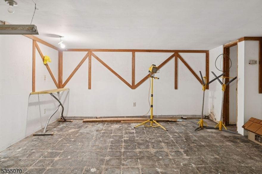 Here comes your opportunity to own 0.9889 acres of land off Route 10.  Property is zoned as residential mixed use option (R-1M).  Owner was running a well know Red Ribbon Gift Ship for many years using part of the downstairs.  This ranch features over 2,300 sf and welcomes you with a screened in porch overlooking yard, impressive large foyer with high ceilings, huge living room with a beautiful window. sizable eat-in kitchen, dining room with door to the backyard, family room with a fireplace, master bedroom with walk-in closet and powder room, two spacious bedrooms and main bathroom, All large rooms! The unfinished part of the full basement offers plenty of opportunities for entertainment or other uses according to your needs.  Fenced in backyard features patio and in-ground concrete swimming pool.  Beautiful, large property is waiting for you and your vision!! House needs work and is sold strictly in AS IS condition, water and heat are off.  Come and explore the opportunities this property offers!