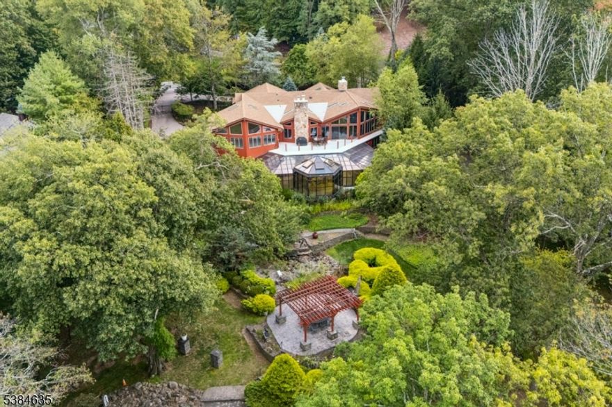 Nestled in one of the desired and affluent area this 6BR 7.5Bth Lakefront split level home has a lot to offer. Sitting on a 1.4acre lot this home has a large entry foyer, a proportionally size receiving room, a huge dining & living room area w/ direct access to a spacious terrace overlooking the backyard and the lake, an oversized eat-in kitchen with adjoining butler room, 4 fireplaces and 2 staff quarters. In the 1st level, there are 2 proportionally sized bedroom sharing a full size hallway bathroom,  a large bedroom with ensuite bathroom,  and an oversized main bedroom and bathroom (both with a tub and standing shower). The second level which is above ground has 2 appropriately sized bedroom both with ensuite bathroom. The second level has a huge recreational, visual and audio room which leads to a colossal conservatory/solarium with a wet bar perfect for entertainment and gathering for any occasion(s).The backyard has a pergola and barbeque area if you so desire to go have an outdoor cookout. The backyard has a lot of trees that provides a great shade on hot sunny days. Plenty of area to do your landscaping vision as well. This home has a 2-car garage and ample fenced area for 4 more vehicles. In addition, the whole roof has just been replaced. Whether it will your Primary or an Investment Property,  this is truly a home you don't want to miss out. Call now to book your appointment to see it in person.