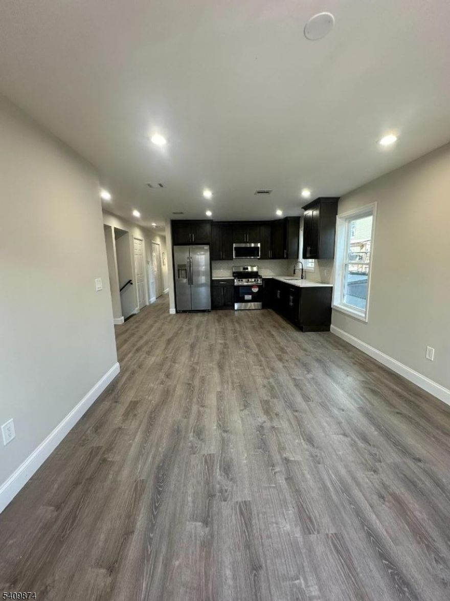 This newly built apartment offers a modern and spacious living experience, featuring three bedrooms and two full bathrooms.The master bedroom includes an en-suite bathroom, providing privacy and convenience.The kitchen is a standout feature, equipped with brand-new, stainless steel appliances.The open floor plan seamlessly connects the kitchen to the living and dining areas. PARKING AVAILABLE