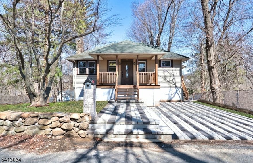 Charming, fully renovated single-family home for rent in prime Lake Hopatcong's, Nolan's Point section. The home has recently been renovated from top to bottom and offers the finest in modern amenities and finishes. Be the first to move into this practically brand new home. You are greeted to an open living and dining room oozing with natural light and featuring a fireplace, recessed lighting, new flooring, chic new full bathroom, and 3 bedrooms. The master bedroom offers double closets and has a closet organizer perfect to keep your clothing organized and neat. Downstairs has a family room, bedroom, office, full bathroom, and laundry center. Downstairs can offer versatile space if sharing the home. Outside: covered patio and fenced-in yard. Walk to your favorite restaurants....The Jefferson House, The Windlass, and more. Lake Hopatcong, New Jersey's Largest Lake offers Gas Boats, Jet skis, Sailing, Kayaking & More! 1Hr from NYC! Don't miss out on this beautifully renovated gem. Schedule a viewing today! DO NOT PARK IN NEIGHBOORS DRIVE.