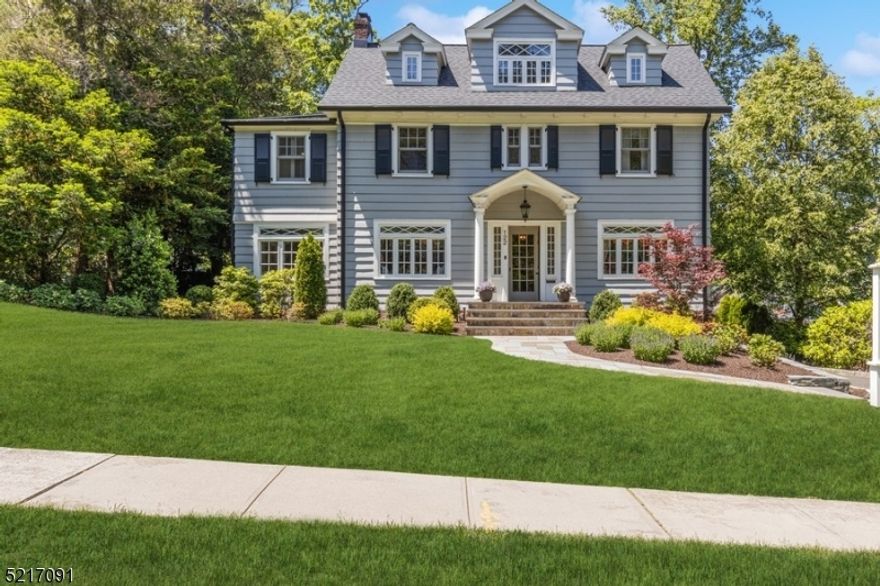 This Northside colonial is moments from town. Located in Summit's finest neighborhood, this desirable home has everything. Four floors of useable living space create a wonderful setting for entertaining and private outdoor living. From the balcony off the primary bedroom to the built in gas fire pit on the bluestone patio, there's nothing more to do but move in and relax. The private and lush backyard is accessed easily from the lower level and first floor.  The unique oversized porch with beautiful mahogany floors, overlooks the backyard. This particular property is an opportunity not to be missed.