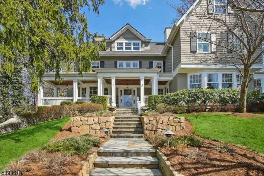 Prime Summit Location! Nestled blocks from the heart of downtown Summit, 115 Beechwood Road offers an unbeatable blend of convenience and timeless charm. Perfectly located in Summit's sought-after Northside neighborhood within the Lincoln Elementary School district, this exquisite, expanded home is only 0.6 miles to the Summit train station (direct to NYC), top-rated schools, parks, and the vibrant downtown filled with restaurants, shops, and cafes.A welcoming wraparound porch opens to a classic center-hall layout with an elegant foyer, formal living and dining rooms, and a gourmet kitchen with soaring ceilings and a separate breakfast room. The fireside family room opens through French doors to a bluestone patio and private backyard ideal for entertaining. The first floor also includes a home office/flex space, powder room, and mudroom. Upstairs, the primary suite features a gas fireplace, walk-in closets, and a luxury bath with steam shower, Jacuzzi tub, and radiant heated floors. Additional bedrooms and baths offer comfort and style, while the finished lower level includes recreation areas, an exercise room, laundry, and ample storage. With an oversized two-car garage, whole-house generator, and beautifully landscaped property, 115 Beechwood Road delivers the ultimate Summit lifestyle where location truly makes the difference.