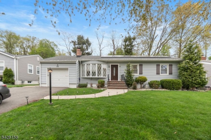 Fantastic opportunity to own a beautifully maintained 3-bedroom ranch in the highly desirable Fairway Drive area. This inviting home features central air, gleaming hardwood floors throughout, a spacious living room with a wood-burning fireplace, and a formal dining room perfect for entertaining. Two full bathrooms offer added convenience. The finished basement expands your living space with a bar area, recreation room, utility/laundry room, and abundant storage. A wonderful place to call home!