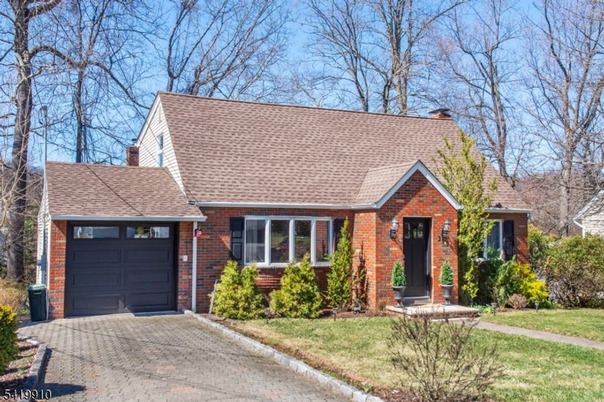 Sophistication, class and a sense of calm. If this is what is on your "must have" list for your next home then this is it. This 4 bdrm cape cod home is not your typical one, with an addition in 2007 to add more sq footage and create larger bdrms upstairs this home now has more than 1600 sq ft plus a full finished basement. As you enter through the front door you are surrounded by sunlight from the windows that showcase the gorgeous floors throughout the main level. Neutral paint creates a serene backdrop for the renovated kitchen with soft gray cabinets. The back room offers another space for dining and entertaining along with a fireplace for cozy fall & winter nights. Two bdrms and a full bath round out the main level. Upstairs you will find two large bdrms with plenty of closet space and a style that feels like your staying in a lavish hotel. Newer carpets and another full renovated bathroom complete the 2nd level. The basement is finished off with a gathering space and a 2nd fireplace. A bar area sits to the right with groovy lighting that takes you back in time.  A laundry area with counter and extra sink add to this space and as an extra bonus, a 3rd full bathroom. Outside you'll find an attached garage, well manicured yard and a deck off the back perfect for spring and summer gatherings. Close proximity to schools, parks, restaurants, shopping and easy commuter location being close to highways & public transportation. Optional membership to the Lionshead Lake nearby