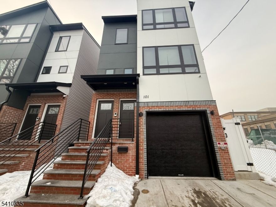 Modern, move-in ready apartment in a new construction building! This bright home features an open-concept living/dining area with oversized windows, recessed lighting and beautiful hardwood floors throughout. The sleek kitchen offers white shaker cabinets, subway tile backsplash, quartz countertops with peninsula seating and a full stainless steel appliance package.Enjoy the convenience of in-unit laundry, a spacious walk-in closet, and a stylish full baths with large-format tile and black fixtures for a clean, contemporary look. Well-designed layout, neutral finishes and great natural light make this the perfect place to call home just unpack and enjoy.