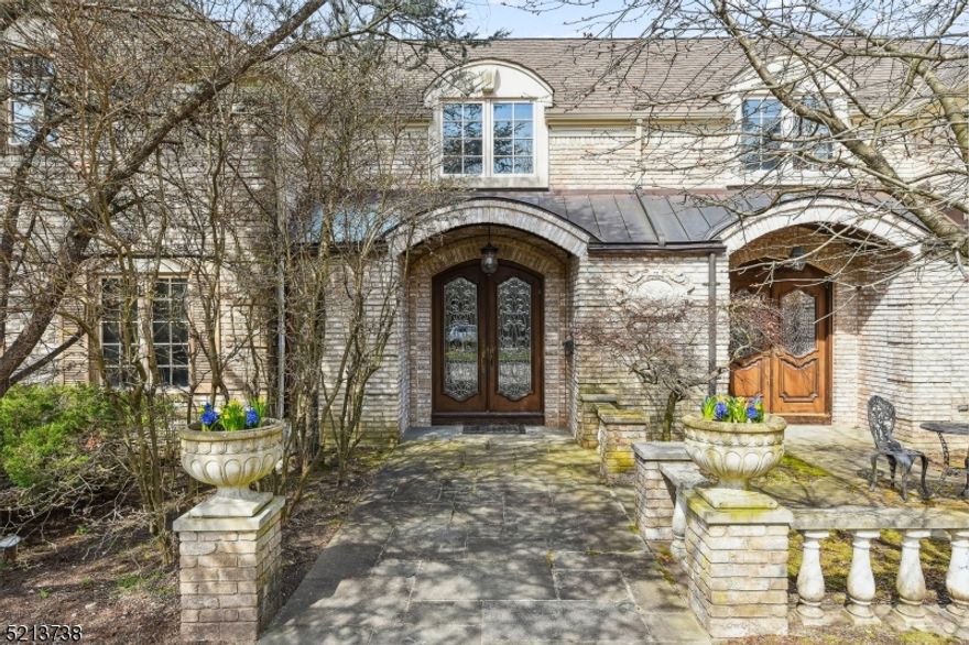 Stately colonial home in Chestnut Hill. Wonderful home for entertaining. Walk into a large foyer with a beautiful and impressive staircase.Large living room opens into a large family room with stained glass lighting, custom cabinets & wood burning fireplace. A well appointed kitchen with Dacor appliances and a separate Sub Zero refrigerator and Sub Zero freezer make for a cook's dream come true. Loads of cabinets, counter space and pantry let you create to your heart's delight. If you work at home there is an office on the first floor, 2 powder rooms and an in law/guest suite. The main level laundry room is large and also has lots of cabinets and a closet. Upstairs, the primary bedroom has two walk in closets, a sitting room (which can also be used as an office) and a large primary bath with a separate jetted tub and steam shower. The finished basement has a wonderful playroom/rec room with plenty of room for a theater. There is an additional room perfect for an exercise room plus there is a kitchen, bathroom and changing room. The basement is walk out and leads to a fabulous inground pool & Spa. The property is large, level and has plenty of room even with the pool. This is a forever home!