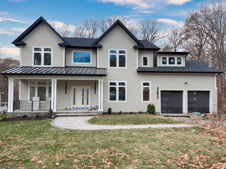 Welcome to this stunning NEW CONSTRUCTION colonial home, located in the desirable Broadlawn neighborhood on a quiet street. Set on 0.5 acres, this impressive 6-bedroom, 5.5-bathroom residence offers 5,200 sf of luxury across three levels. Inside,  The gourmet eat-in kitchen is a chef's dream, featuring custom cabinetry, a spacious center island, high-end appliances, 48  build-in Refrigerator, quartz countertops, and a walk-in pantry. The family room flows seamlessly from the kitchen and includes an elegant electric fireplace and sliding doors leading to a large paver patio and expansive flat backyard ideal for entertaining. The grand double-height foyer introduces the main level. The first floor boasts 10ft High Ceilings, which also includes a formal living room, sophisticated dining room, guest ensuite, stylish powder room, and practical mudroom.Upstairs with 9' ceiling height has four generously sized bedrooms, including a luxurious primary suite with spa-inspired bathroom featuring a soaking tub, stall shower, and dual sinks. One additional bedroom is en-suite while the other two share a full bathroom. A convenient laundry room is also on this floor. The finished walkout basement boasts impressive 9-foot ceilings and provides additional living space with a bedroom, private office, large recreation room, and full bathroom. Modern smart home features and a 10yr reputable builder's warranty ensure peace of mind. Close to schools, major highways, parks and more.