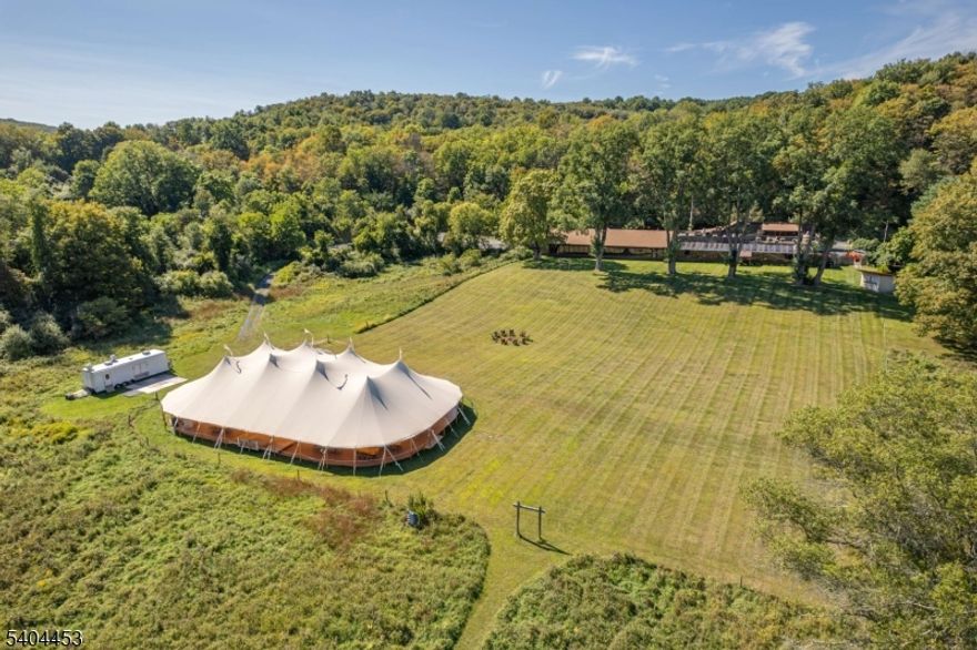 Iconic NJ Restaurant Destination for sale. Owned by the operators since 1949, the restaurant and event facility has been a dining destination for years. Large operating restaurant business and event business that has been thriving for decades. Over 1000 feet of frontage on the Flat Brook River. Surrounded by the 65,000- acre Delaware Water Gap National Recreation Area, this property is a secluded sanctuary with limitless potential. The existing structure offers ample space to build out guest rooms, creating a boutique inn, a premier corporate retreat, or a wedding venue. Open fields and beautiful views, ideal for equestrian use as well. World-class hunting, plus swimming and fishing on the adjacent Flat Brook.