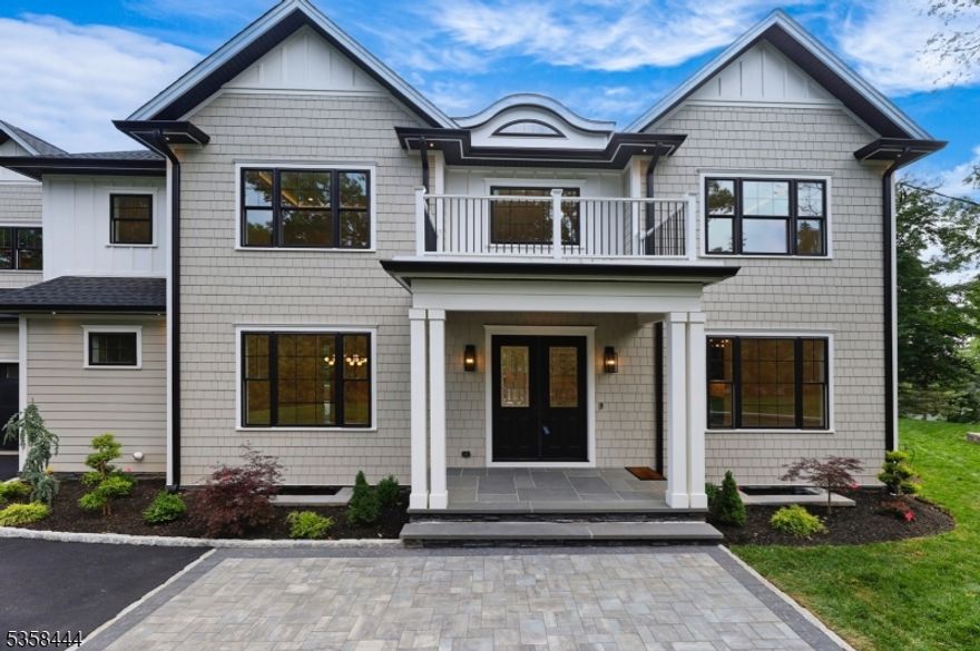 Exceptional New Construction with Custom Finishes and Private Setting. Discover unparalleled luxury in this custom-built, new construction home set on a brand-new foundation in a private, serene location. Boasting 7 spacious bedrooms and 6.5 elegant baths, this residence is thoughtfully designed for both comfort and style. The heart of the home features a gourmet kitchen with custom cabinetry, Wolf 6-burner range, Sub-Zero refrigerator, and a butler's pantry, perfect for entertaining. High ceilings enhance the expansive feel throughout, while the family room with a wet bar invites relaxation and gathering. Retreat to the primary suite, complete with two walk-in closets and a private wet bar a luxurious space to unwind. The finished walk-out basement opens to a beautifully crafted patio, ideal for indoor-outdoor living and entertaining. A rare opportunity for those seeking space, quality, and privacy. This home features surround sound home system, LED cove lights, and an electric vehicle charger, offering convenience for modern living. Multi zone heating and cooling system. Craftsmanship is evident in every detail of this exceptional home.