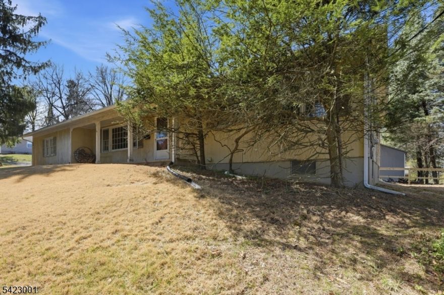 Renovation Opportunity in Prestigious Lake Mohawk Community! Located within the highly sought-after Lake Mohawk community, this 3-bedroom, 2 full bath ranch offers incredible potential for the right buyer. Set on a desirable corner lot with side-entry 2-car garage on a quiet street, this home is ready for an investor, builder, or buyer looking to create an updated dream home.  The property features a 2025 roof and newer furnace, providing a solid starting point for your vision. With its single-level layout and prime location, the possibilities here are endless. Enjoy all that Lake Mohawk has to offer, including lake access, beaches, boating, dining, and a vibrant year-round community.  This home offers a large unfinished basement and is a short distance to Lake Mohawk Upper Lake & Beach area. Estate sale " being sold as-is." Bring your ideas and transform this diamond in the rough into something truly special!