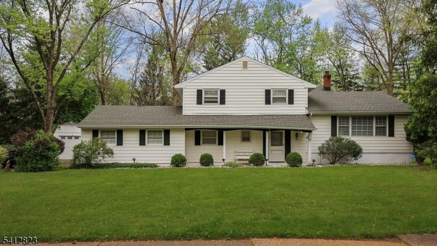 Nestled on a beautifully level lot, this spacious split-level home offers exceptional comfort, functionality and timeless charm. This residence features five generously sized bedrooms and two and a half bathrooms, providing ample space for out of town guests, or a home office setup.   The highlight of the home is the stunning sunroom, complete with a cozy fireplace and beautiful stone flooring, creating a warm and inviting atmosphere year-round. The eat-in kitchen offers plenty of space for everyday meals, with a convenient walk-out door leading directly to the expansive deck - ideal for outdoor entertaining, summer barbecues or simply unwinding in your private outdoor space.  The thoughtfully designed split-level layout provides both open gathering areas and private living quarters, creating a wonderful balance of comfort and versatility. This home combines generous living space, unique character, and a fantastic outdoor setting - an excellent opportunity to own a warm and welcoming home in a desirable setting.