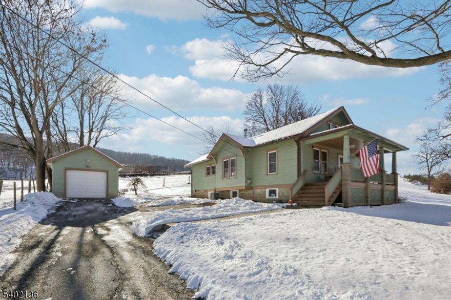 OUTSTANDING 3 BDRM POTENTIAL WITH WALK UP ATTIC! Renovated just 4 years ago, every major component has been thoughtfully upgraded including HVAC, roof, windows, and more giving you peace of mind for years to come. Step inside and you'll find hardwood floors in the bedrooms, a spacious living rm, and a huge kitchen with abundant cabinets and counter space. The separate eat-in dining room is perfect for family meals or entertaining. Upstairs, the walk-up attic offers incredible potential for a third bedroom, office, or creative space. The full basement is ready to be finished, giving you even more room to grow. Outside, enjoy a welcoming front porch, a deck overlooking the yard, and a detached 1-car garage. Surrounded by farmland on three sides, this property offers privacy, tranquility, and sweeping views of the countryside. Whether you're looking for a starter home, a peaceful retreat, or a place with room to expand, this property checks all the boxes. Don't miss your chance to own a home that combines modern updates, classic charm, and endless potential all in a serene rural setting.
