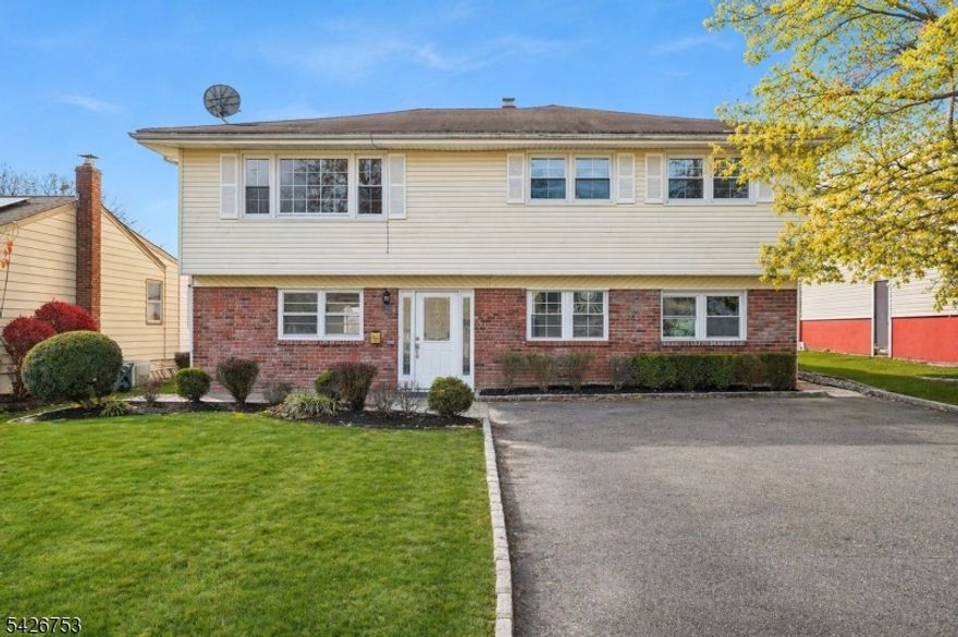 Don't miss this Amazing Home!!! Boasting 5 bedrooms and 3 full baths this Large Private home set on lovely street with 2 Full Eat In Kitchens!!! Boasting a bright open kitchen with breakfast area leading to large 21x17 deck accessing patio and yard, formal living room and dining rooms complete the entertaining space.Three bedrooms on this level include a Large primary suite with walk in closet, double closet and a primary bath with new vanity. Two additional bedrooms and hall bath complete this level.  The lower level features a large 25x12 Family room with access to patio and yard. Eat in kitchen with large eating area, lots of cabinet space and pantry, 2 bedrooms with spacious full bath, laundry room make this the perfect home!. Just blocks to houses of worship, stores, grammar & high school. Public transportation to NYC and easy access to Rt 280.