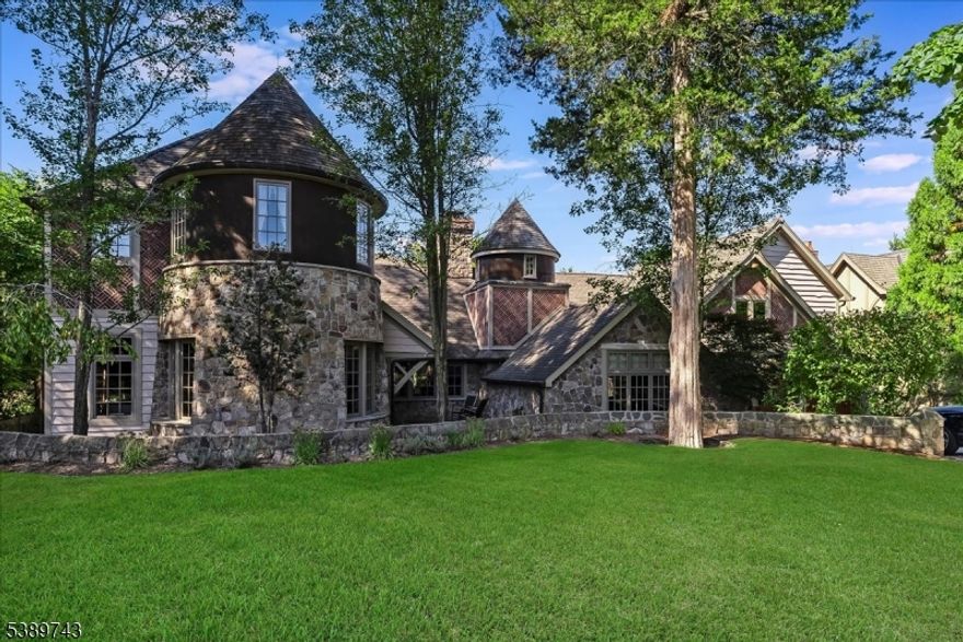 Exquisite Luxury Lakefront home.  A rare opportunity to own a premier residence on a private island home to only 34 beautiful lakefront properties. This 5 BR 6.1 BA estate like masterpiece is packed with exceptional quality and timeless design.  Set on a sweeping lawn with a large lakefront patio, this home delivers upscale lake living and privacy with its resort style pool, cabana and new boathouse offering direct access to lake adventures. Entertain in style with a new gourmet kitchen featuring a wood burning stone fireplace and french doors that lead out to your outdoor cooking station complete with cooking fireplace and inviting patios.  Retreat to the second floor primary suite equipped with a full bath, walk in closet, stone fireplace, sitting room with a covered porch to take in lake views. Spacious second floor office wing with a private bath and separate entrance providing a comfortable and substantial work environment.  Greet your guests with a unique bar room off the foyer then step into the rustic living enjoying wonderful lake views and gather around a cozy fireplace. The finished basement includes an exercise room, full bath with a seam room and wine storage. A lifestyle unmatched just an hour from Manhattan.