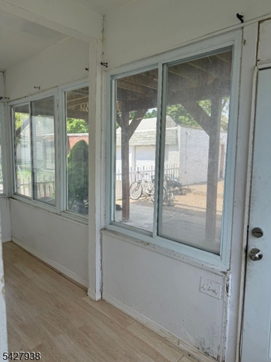 Second floor renovated apartment offers 2 bedrooms, living areas, eating kitchen. available immediately.