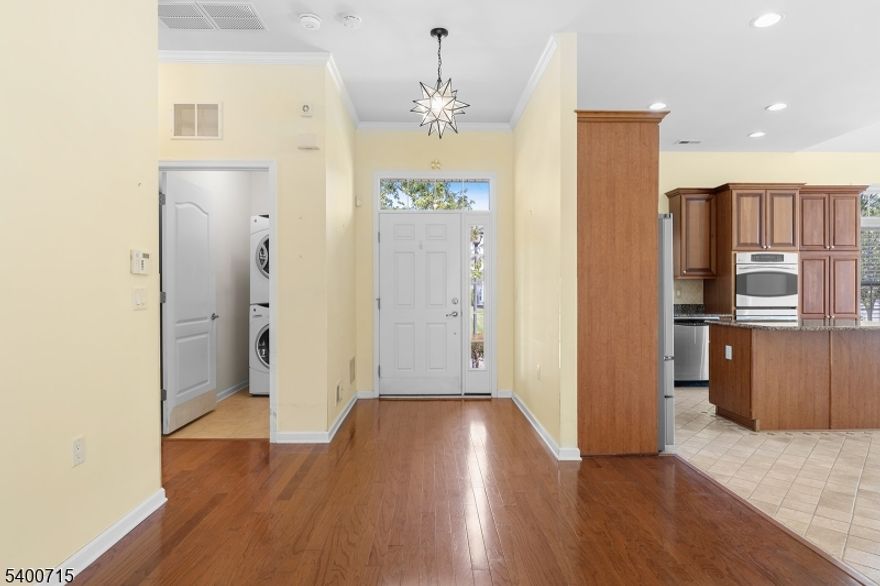 Huge Price reduction on this special home making it the lowest price in the sought after Gated Community of Stonebridge. One of the many great features of Stonebridge is gas heating and cooking. This property offers a bright open floor plan with wood floors throughout much of home. The kitchen boasts SS appliances which include a double oven, a refrigerator with double freezer drawers, and a center island plus all counter tops are granite in the kitchen as well as both bathrooms. The Clubhouse is 40,000 ft with indoor and outdoor pools plus lots of activities and it is only a short distance from this property. Shopping and restaurants are also conveniently located.