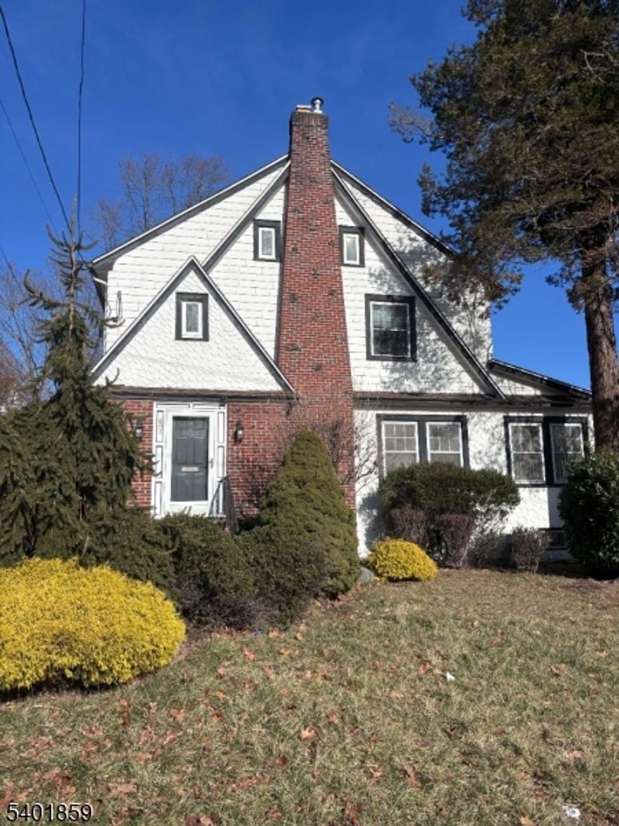 Warm and welcoming, this beautifully maintained 4-bedroom, 2.5-bath historic home (or 3-bedroom plus office!) blends timeless architectural character with modern comfort. High ceilings, oversized windows, and original hardwood floors fill the home with natural light and enduring charm. The main level offers gracious living and entertaining spaces, including an oversized formal dining room ideal for gatherings, a spacious kitchen with an eat-in nook, and flexible areas perfect for remote work, study, or play.  All four bedrooms are located on the second floor, including a spacious primary bedroom with ensuite bath. A thoughtfully renovated full bathroom features spa-like finishes including a soaking tub, double vanity, and towel warmer. Additional highlights include a dedicated playroom, ample storage, and laundry located in the basement. Outdoor living is equally inviting with an oversized deck and covered patio, perfect for relaxing or entertaining. The basement offers additional functional space, ideal for fitness or recreation. Conveniently located in a friendly neighborhood close to local shops, dining, parks, and reservations, with easy access to nearby Maplewood, South Orange, Verona, Montclair, and the Short Hills Mall. A rare opportunity to enjoy classic charm, space, and convenience in one of North Jersey's most desirable areas.