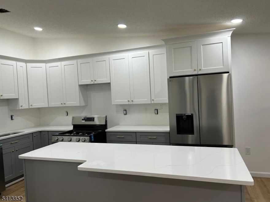 Completely renovated home featuring recessed lighting throughout. Brand-new upgraded kitchen and bathroom with new appliances. New HVAC system, new water heater, and new flooring throughout.Quartz Counter Tops in the Kitchen.