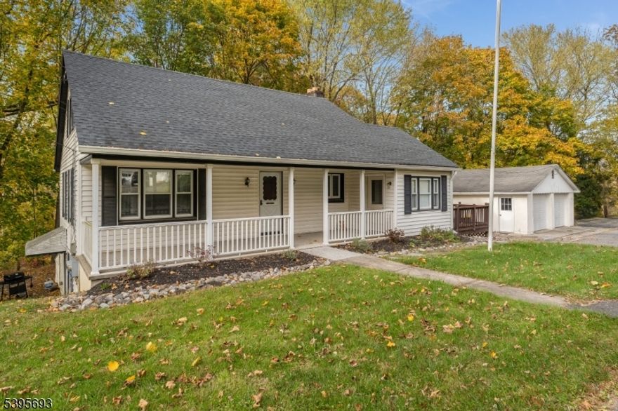 A 4BR & 2-1/2 COLONIAL/CAPE WITH A FINISHED BASEMENT IN-LAW SUITE WITH ITS OWN SEPARATE ENTRY AND PARKING AREA. ALSO A LEGAL TWO-FAMILY HOME. THIS LOVELY WARM-AND-INVITING HOME IS NESTLED ON A LOVELY MOSTLY WOODED 3.98-ACRE LOT WHICH COMES COMPLETE WITH A TWO-CAR DETACHED GARAGE/WORKSHOP, PLENTY OF PAVED PARKING, AND A GREAT LOCATION JUST MINUTES FROM RT 78 ON A LIGHTLY TRAVELED COUNTRY ROAD.  THE MAIN LIVING AREA FEATURES A FULLY-EQUIPPED READY-TO-GO KITCHEN, A LARGE 19X12 LIVING ROOM, A BIG 19X11 DINING ROOM, THREE/FOUR BEDROOMS INCLUDING A HUGE 16X16 PRIMARY, ONE-AND-ONE-HALF BATHS, A LAUNDRY AREA WITH WASHER & DRYER INCLUDED, A FULL-LENGTH ROOFED FRONT PORCH, AND AN ENORMOUS 32X18 WRAP-AROUND DECK. THE LOWER LEVEL IN-LAW SUITE HAS IT OWN SEPARATE ENTRY AND PAVED PARKING AREA WHICH CURRENTLY RENTS FOR $1600/ MONTH. IT OFFERS A SPACIOUS 15X11 LIVING ROOM, A FULLY-EQUIPPED READY-TO-GO KITCHEN, AN OVER-SIZED BEDROOM, A FULL BATH WITH A SHOWER AND DOUBLE VANITY, AND ITS OWN LAUNDRY AREA COMPLETE WITH A WASHER AND DRYER. 24-HOUR NOTICE REQUESTED WHEN SCHEDULING ALL APPOINTMENTS.