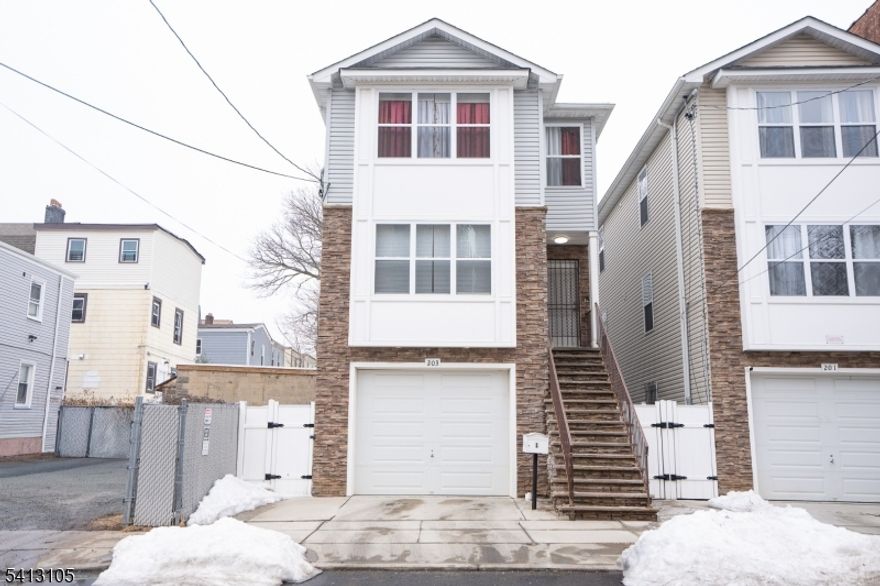 Welcome to this stunning new construction multi-family property finally on the market! Each spacious unit features 3 bedrooms and 2 bathrooms, highlighted by an open-concept living area and eat-in kitchen designed for modern living. Every unit includes a private master bathroom, offering comfort and convenience.The ground level boasts an attached garage along with a beautifully designed 1-bedroom apartment featuring high ceilings, a full bath, and an open-concept kitchen.With strong rental income and excellent tenants already in place, this property presents an incredible opportunity to build wealth while enjoying a luxury living environment. Comes with a 5 Year Home Builder's Warranty.