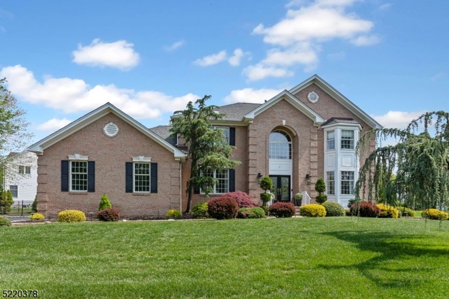 Spectacular Contemporary Colonial located in the Whippany section of Hanover Township known for low taxes & excellent schools. Located on a tree lined cul de-sac this 5 bedroom home offers an open & airy layout The spectacular entry way introduces you to this fine home with updated railings & new chandelier up to the second floor. Spacious kitchen features an oversized island, granite countertops, glass backsplash, premium light fixtures and hardware, SS appliances, oversized undermount sink & custom design cabinetry. First floor bedroom with adjacent full bath & laundry room. Family room area includes premium recessed lights with oak wood floors throughout, classic molding & a gas fireplace encased by a beautiful mantel. Sunken living room & formal dining room with tray ceiling. Upper level with oversized primary features oak hardwood floors, tray ceiling, large walk-in closet with a custom organization system. The updated  primary bath with premium fixtures & glamour throughout including classic shutters & skylight. Three additional bedrooms & full bath with skylight. Finished expansive basement, 9Ft ceilings, bath, kitchenette & area for gaming etc. Flat lot with landscape lighting & sprinkler system. Azak 40 x 14 deck, patio with built in fireplace. New driveway with Belgium blocks. Hanover Township has a beautiful town pool (additional fee), community center, before/after school programs. Easy access into downtown Morristown & Convent Station NYC Midtown Direct Train.