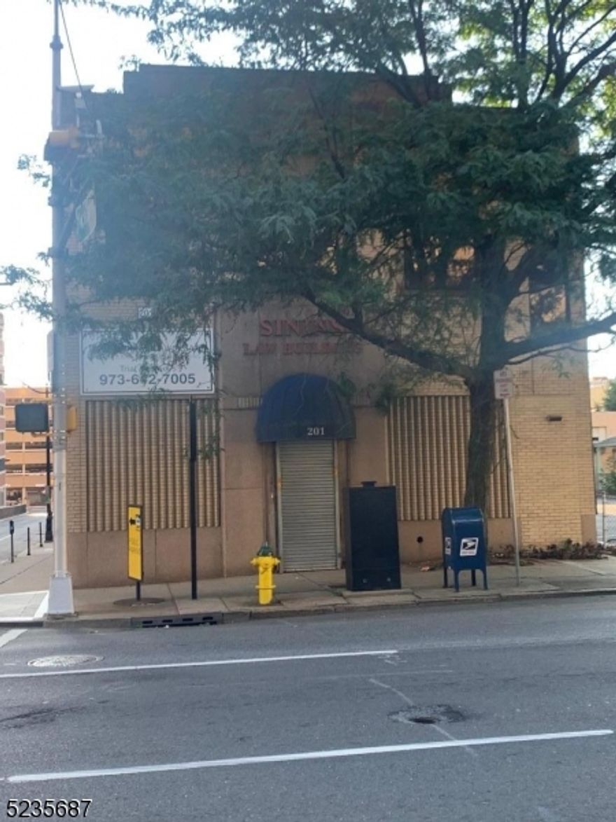 Located in the heart of Newark Downtown District, directly across from Prudential Insurance Office Building, this unique two storey Office building is excellently located. It is is within walking distance to Rutgers University, Rutgers Law and Business School, Seton Hall Law School, Prudential Center, NJPAC and Newark Penn Station. The location is easily accessible to major Highways-NJ Turnpike, Garden State Parkway, Routes 1 & 9, 21, 22, 78 and 280. It is near extensive bus and train lines-Path, NJ Transit, and Amtrak. Just steps from Washington Street Train Station, it may have a great potential for a high rise mixed use conversion. Building has approximately 8800 sf including finished basement, and has tenants.