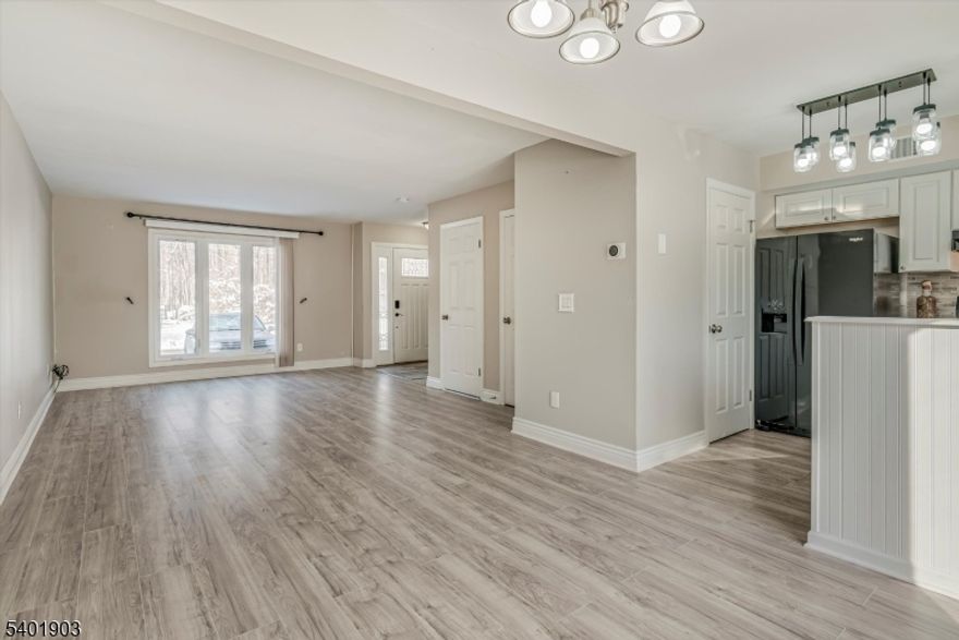 This beautiful Rolling Hills unit presents an open concept living and dining area that leads to a spacious back deck via sliders. The kitchen is beautifully designed with sleek black appliances. Upstairs, two spacious bedrooms await, including the primary bedroom with a walk-in closet and loft ideal for an office, exercise room, or storage space. The large finished basement provides ample room for recreation, convenient storage space, and a dedicated area for laundry and folding.**The $315 monthly HOA FEE INCLUDES WATER, SEWER, TRASH COLLECTION, SNOW REMOVAL AND MAINTENANCE IN COMMON AREAS.**Residents of Rolling Hills enjoy well-maintained grounds and access to a fantastic array of amenities, including a clubhouse, swimming pool, tennis courts, soccer fields, basketball courts, and a playground.