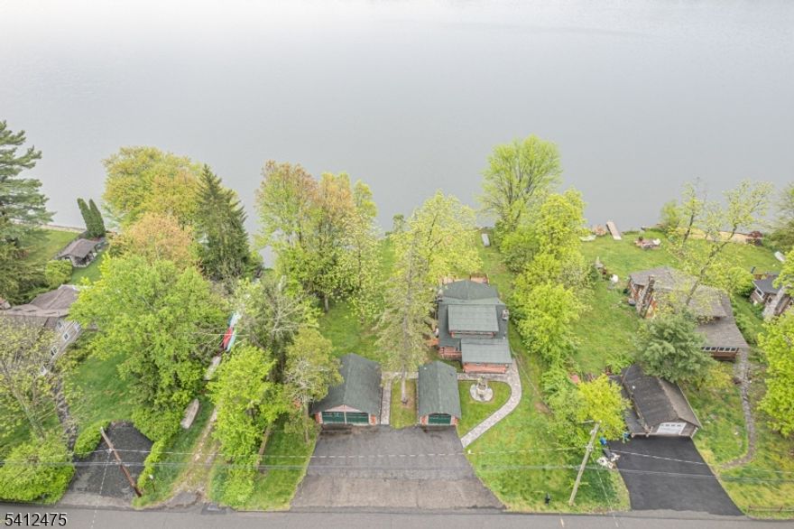 Incredible log cabin lakefront rental available immediately! Pinecliff Lake is in the center of town and so is this awesome opportunity to rent a true log home with a stunning view all year round! This comes mostly furnished so all you have to do is bring personal items, kick back and relax! Rustic charm everywhere you look! Custom built outdoor fire pit/patio area! Woodburning stone fireplace inside!  2 huge garages! Super cool loft! Awesome yard! Access to boat-kayaks! Beautifully redone stone walkway! Very well kept home! Sunrises and sunsets are spectacular and so is the fall color scheme throughout Bearfort Mountain! The pictures say it ALL!! Close to food shopping, hiking trails, farmer's markets, apple picking and highways! This is a true serene getaway!