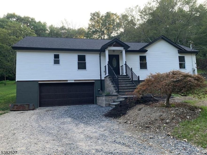 43 Rockport RoadRemarks: Every aspect of this home is brand new. The house boasts a prominent master wing that provides a luxurious retreat. The oversized bedroom is ahaven of comfort, complete with a spacious walk-in closet. The en-suite bathroom is designed for relaxation, featuring a double sink, a soaking tub, and aprivate stall in an oversized bathroom space. The open-concept kitchen is a chef's dream, equipped with all stainless-steel appliances, ample cabinets, andelegant granite countertops. The center island, accented with a tile backsplash and floors, provides both functionality and style. From the kitchen, you canaccess the custom paver patio and garden through sliding doors ideal for enjoying peaceful moments surrounded by nature's beauty. The living room, withits sleek laminate floors, offers a cozy yet sophisticated space for gatherings. This area leads to a second full bathroom and two additional bedrooms.Descend the staircase to discover a fully finished basement, offering versatile space that can be tailored to your needs. This level includes a storage area,laundry room, and a convenient half bathroom. Additionally, the basement provides direct access to an oversized two-car garage, ensuring both security andconvenience. The property sits on a lot just shy of an acre, providing ample space for outdoor activities. Whether you envision gardening, hosting barbecues,or simply enjoying the open air, this expansive yard offers endless possibilities